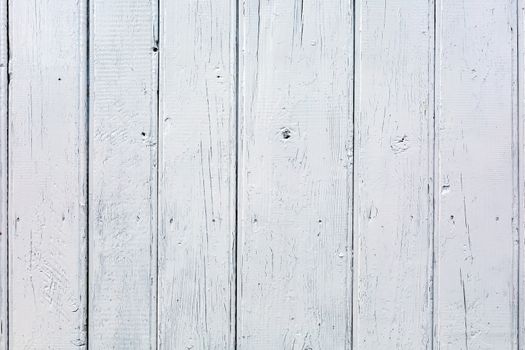 Wwooden background. Vertical boards are white color. Beautiful background texture.