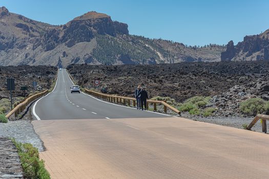 Mountain landscape.A winding mountain highway disappears over the horizon. Stock photo