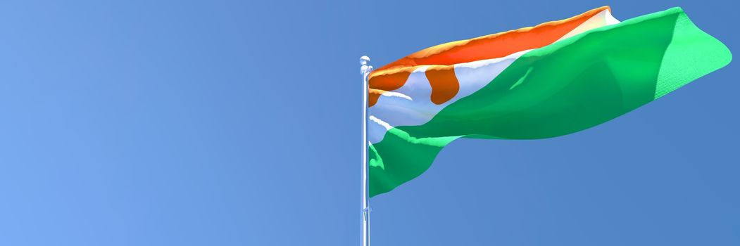 3D rendering of the national flag of Niger waving in the wind against a blue sky