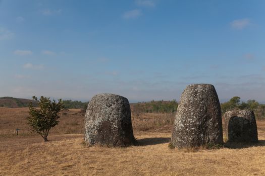 Plain of Jars, Phonsavan, Laos, historic site, the landscape of this area is dotted with hundreds of mysterious stone vessels or jars more than 2000 years old. Also the site of extensive bombing by America in the Vietnam War High quality photo