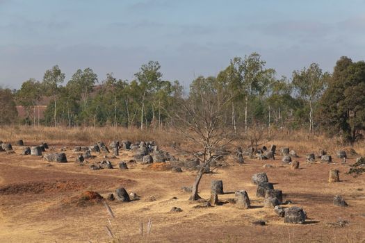 Plain of Jars, Phonsavan, Laos, historic site, the landscape of this area is dotted with hundreds of mysterious stone vessels or jars more than 2000 years old. Also the site of extensive bombing by America in the Vietnam War High quality photo