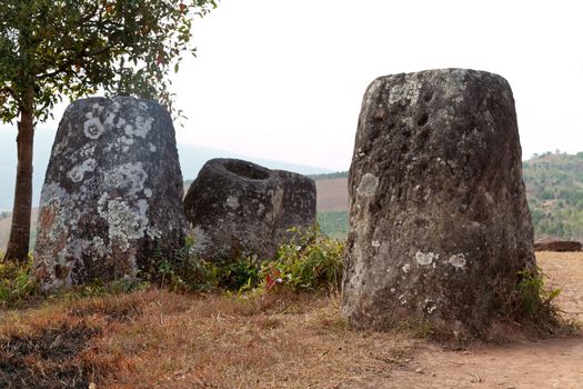 Plain of Jars, Phonsavan, Laos, historic site, the landscape of this area is dotted with hundreds of mysterious stone vessels or jars more than 2000 years old. Also the site of extensive bombing by America in the Vietnam War High quality photo