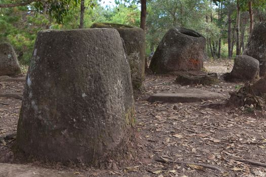 Plain of Jars, Phonsavan, Laos, historic site, the landscape of this area is dotted with hundreds of mysterious stone vessels or jars more than 2000 years old. Also the site of extensive bombing by America in the Vietnam War High quality photo