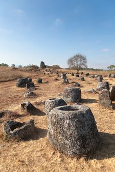 Plain of Jars, Phonsavan, Laos, historic site, the landscape of this area is dotted with hundreds of mysterious stone vessels or jars more than 2000 years old. Also the site of extensive bombing by America in the Vietnam War High quality photo