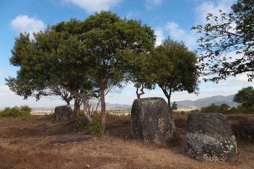 Plain of Jars, Phonsavan, Laos, historic site, the landscape of this area is dotted with hundreds of mysterious stone vessels or jars more than 2000 years old. Also the site of extensive bombing by America in the Vietnam War High quality photo