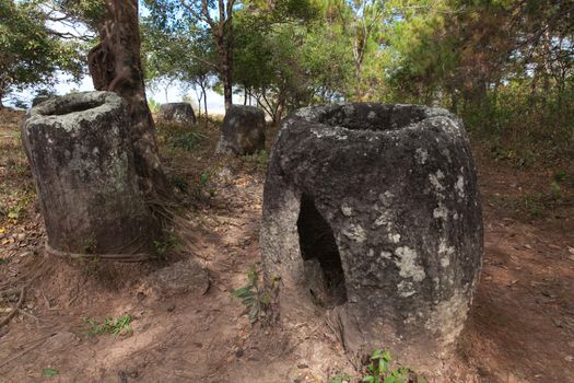 Plain of Jars, Phonsavan, Laos, historic site, the landscape of this area is dotted with hundreds of mysterious stone vessels or jars more than 2000 years old. Also the site of extensive bombing by America in the Vietnam War High quality photo