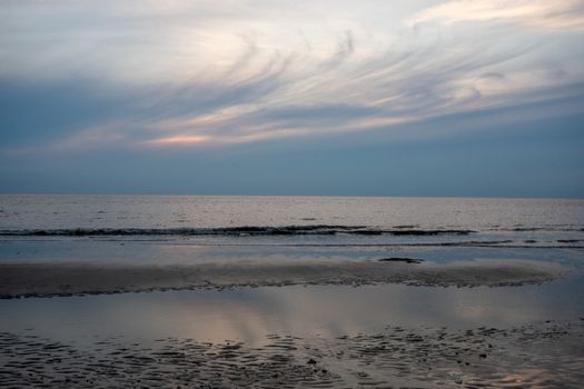 A Whispy Sunset Sky Over the Ocean at the Bay in The Villas, New Jersey