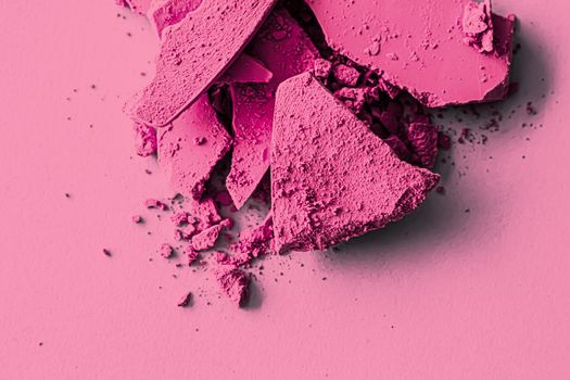 Pink eye shadow powder as makeup palette closeup, crushed cosmetics and beauty textures