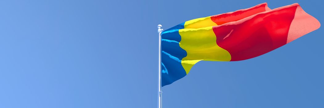 3D rendering of the national flag of Romania waving in the wind against a blue sky