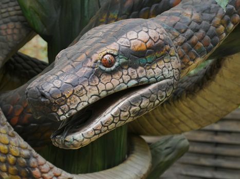 Dinosaurs figures in local autumn park, Ukraine