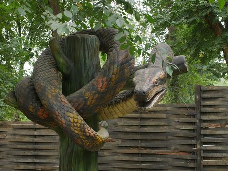 Dinosaurs figures in local autumn park, Ukraine