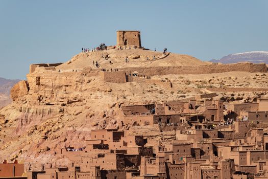 Ait Ben Haddou ksar Morocco, ancient fortress that is a Unesco Heritage site. Beautiful late afternoon light with honey, gold coloured mud brick construction the kasbah, or fortified town dates from 11th cent. and is on the former caravan route from the Sahara and Marrakech. The location has been used for many famous movies. High quality photo