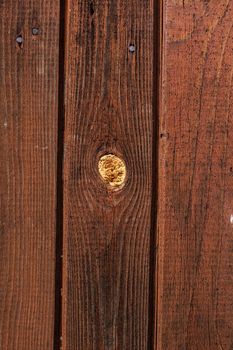 Old brown natural rustic wood background with vertical wooden boards. Space for text.