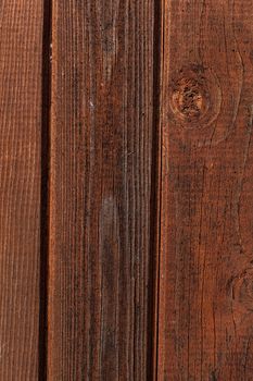 Old brown natural rustic wood background with vertical wooden boards. Space for text.