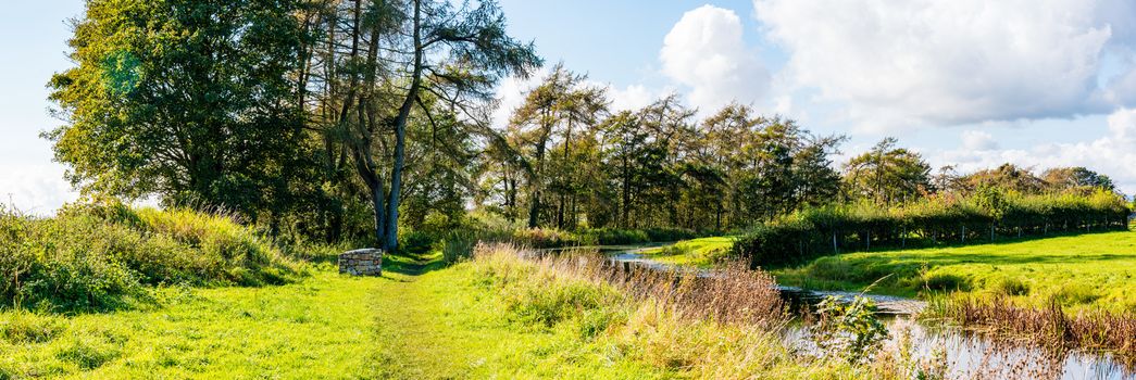 View of an English rural countryside scenery on British waterway