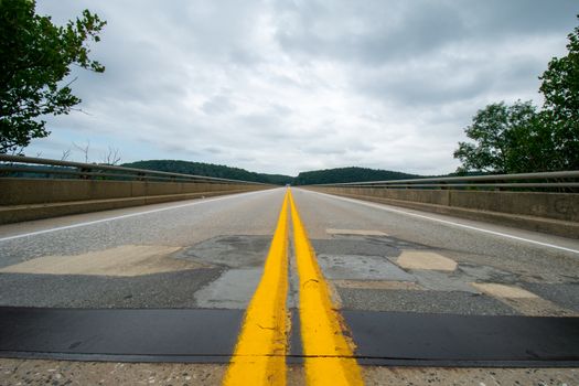 A Low-Angle Shot From the Middle of the Road at the Norman Wood Bridge