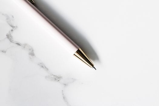 White pen on marble background, luxury stationery and business branding