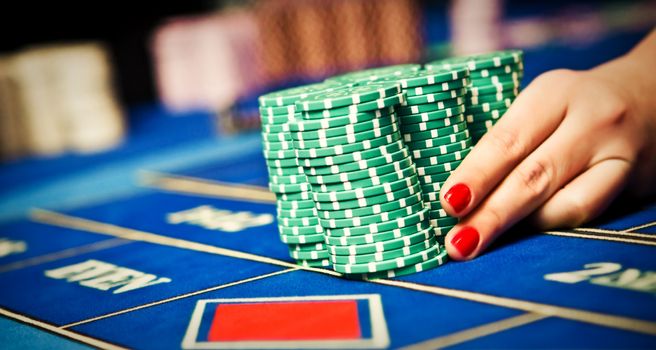 Betting and playing roulette in casino, gambling ads