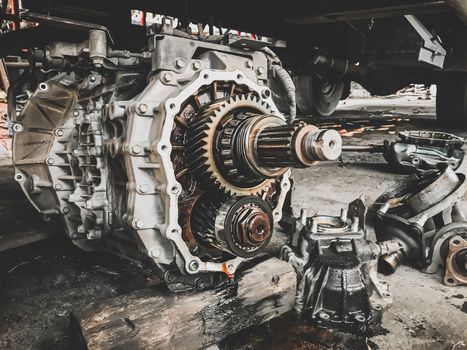 Closeup gears of car engines that have been removed for overhaul and repair in the car garage.