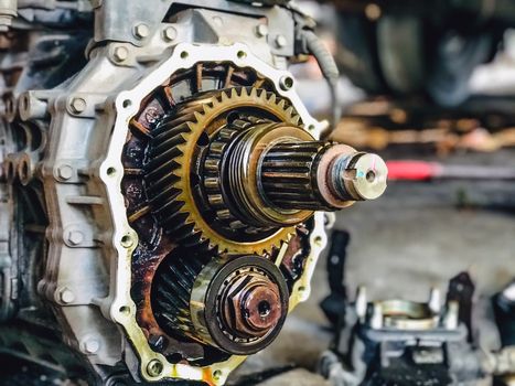 Closeup gears of car engines that have been removed for overhaul and repair in the car garage.