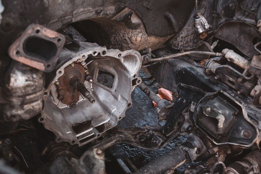 Closeup of the engine compartment of the car with the engine removed for overhaul, transportation and insurance industry concepts.