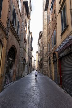 A very old street in a old city, Italy. Typical street of Toscany, Italy.