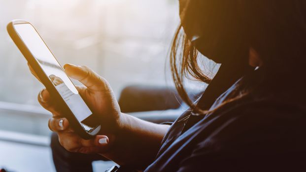 Closeup Image of Women Hand holding a smartphone