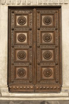Old wooden door with beautiful ornaments