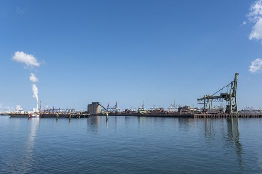 Netherlands, Rotterdam. Coal terminal wih big industrial cranes for handling coal transportation on the Maasvlakte in the port of Rotterdam