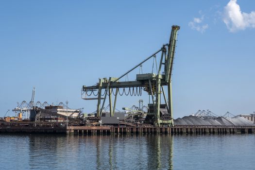 Netherlands, Rotterdam. Coal terminal wih big industrial cranes for handling coal transportation on the Maasvlakte in the port of Rotterdam