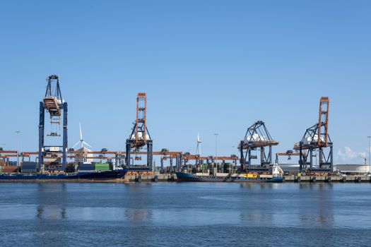 Netherlands, Rotterdam. Coal terminal wih big industrial cranes for handling coal transportation on the Maasvlakte in the port of Rotterdam