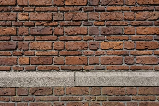 Background of old vintage dirty brick wall with peeling plaster, texture