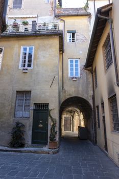 old narrow alley in tuscan village. antique italian lane, Tuscany, Italy