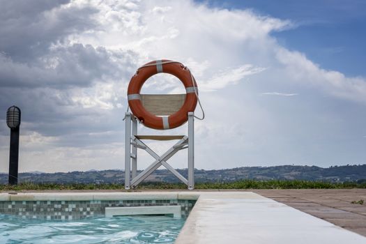 Holiday Swimming pool and a lifebuoy