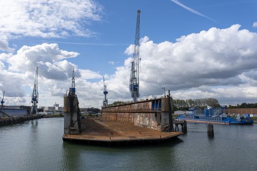 Floating dry dock with cranes in the port of rotterdam, the Netherlands.