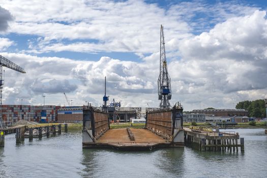 Floating dry dock with cranes in the port of rotterdam, the Netherlands.