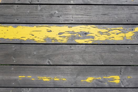 Corroded and damaged seasoned wooden floor plank with scratch marks needs restoration