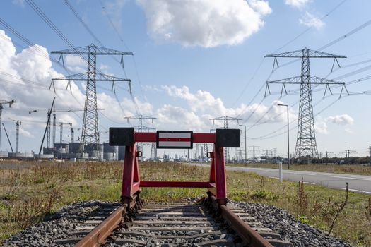 red railroad buffer end to destination in the europoort holland near rotterdam.