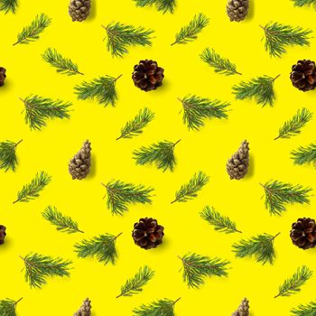 christmas seamless pattern from Pine cones, pine twig, needles on yellow background. modern pine cone christmas collage. Print for paper, fabric, wallpaper or background made frome pinecones.