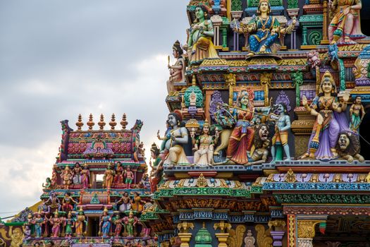 Trincomalee, Sri Lanka - August 23, 2018:Carvings on the roof of the Hindu Temple Pathirakali Amman