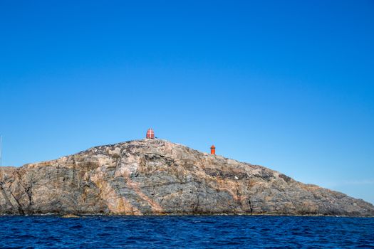 Qeqertarsuaq, Greenland - July 5, 2018: The old wooden whale watching tower. Qeqertarsuaq is a port and town located on the south coast of Disko Island on the west coast of Greenland.