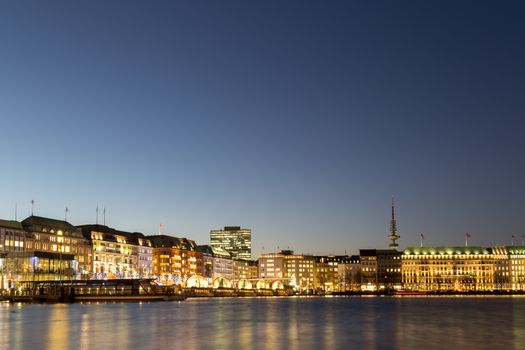 Hamburg, Germany - December 02, 2016: Evening view over the Binnenalster Lake in the city center with the skyline