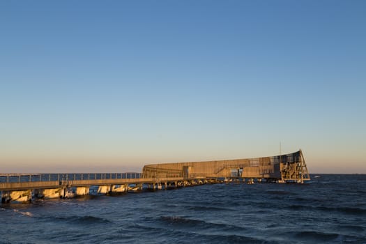 Wooden public bathing pier at Amager Beach in Copenhagen.