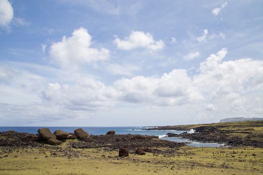 Photograph of the toppled over moais at Akahanga site on Easter Island in Chile.