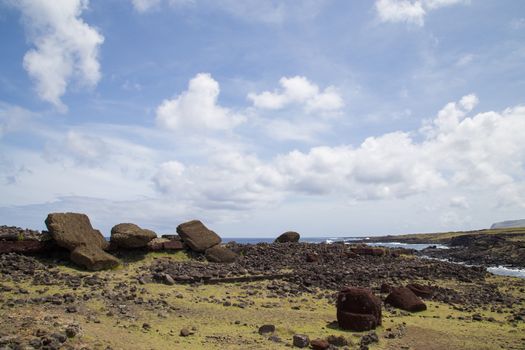 Photograph of the toppled over moais at Akahanga site on Easter Island in Chile.