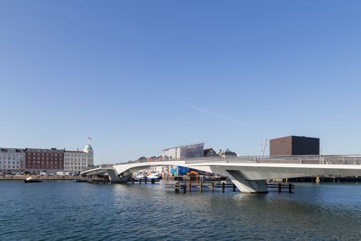 Copenhagen, Denmark - March 16, 2016: Inner Harbour pedestrian and cyclist bridge connecting Nyhavn and Christianshavn.