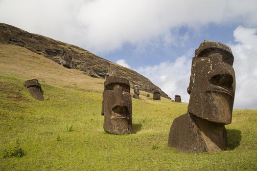 Photograph of the moais at Rano Raraku stone quarry on Easter Island in Chile.