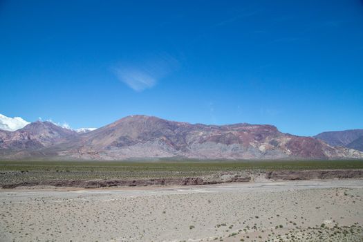 Landscape along National Route 7 through Andes mountain range in Argentina close to the border to Chile