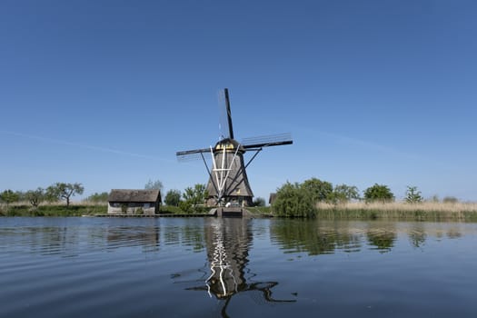 beautiful windmill landscape at kinderdijk in the netherlands. Unesco Site.