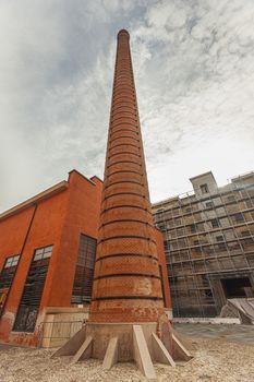 Detail of a Old Industrial building with chimney in Italy